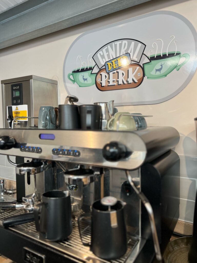 Central Deer Perk coffee machine and sign